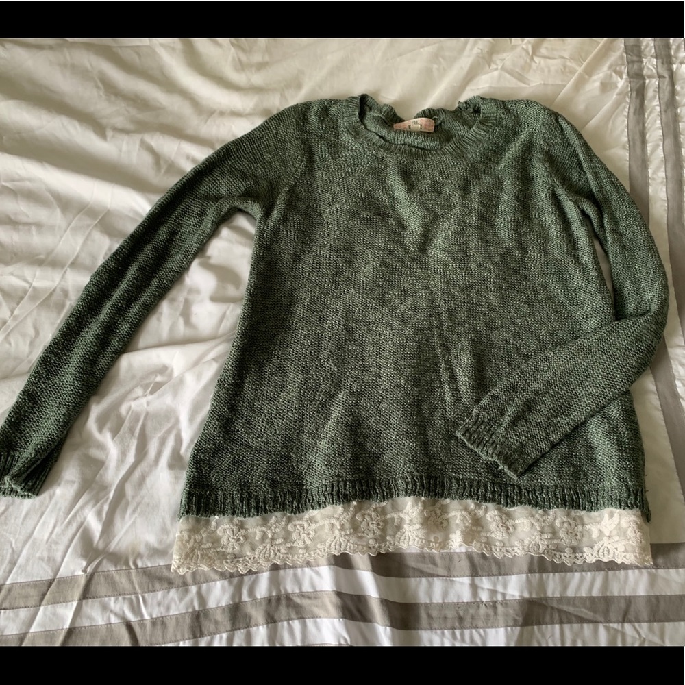 Blue-green sweater with lace detail